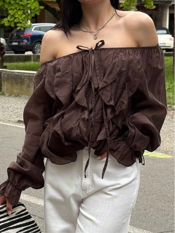 BLUSA CON ROUCHES